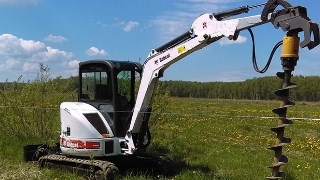 Аренда экскаватора погрузчика с ямобуром в Дивногорск цена от 1585 руб